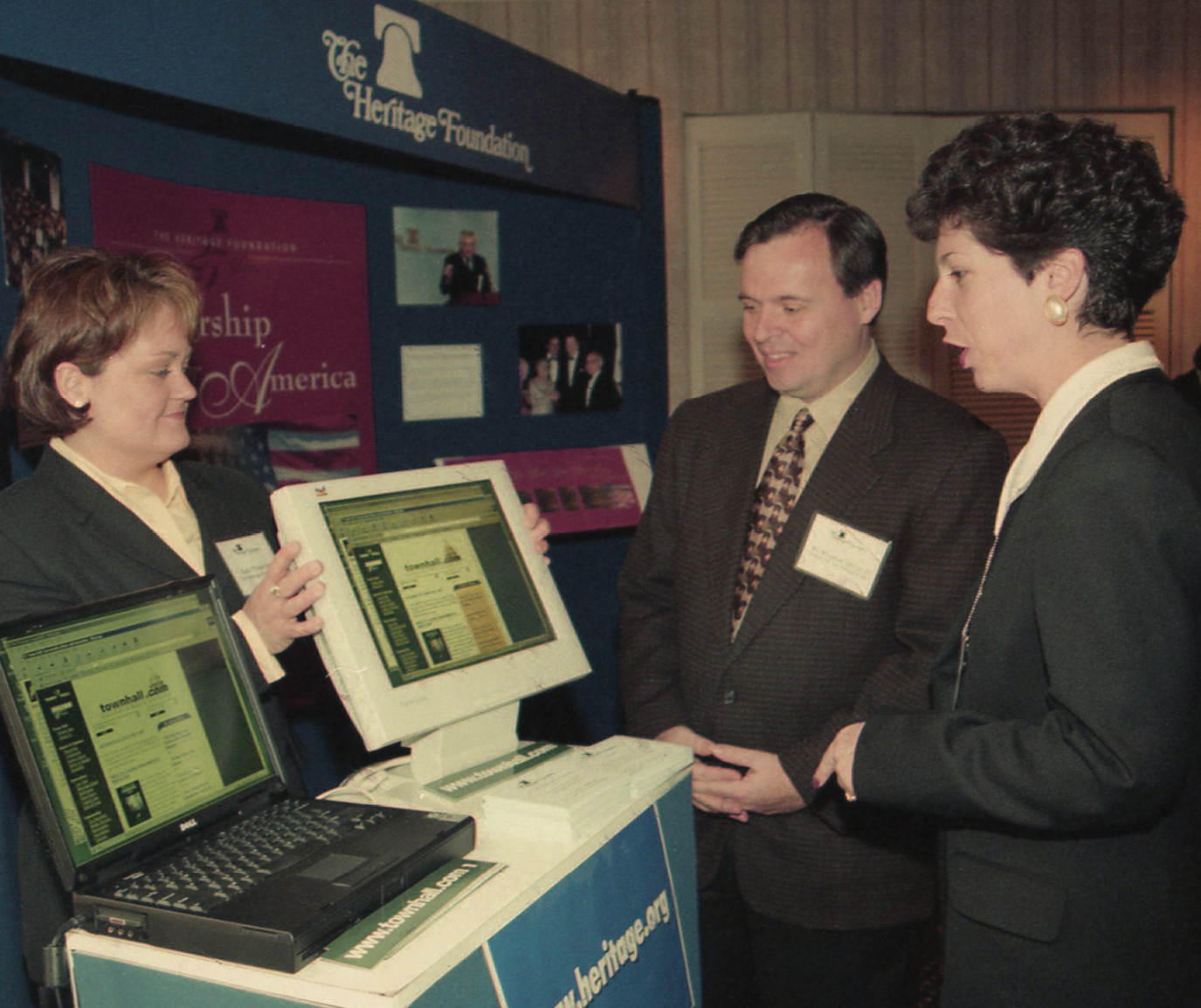 ANN FITZGERALD (right) at The Heritage Foundation booth at the 1999 Resource Bank in Philadelphia. 