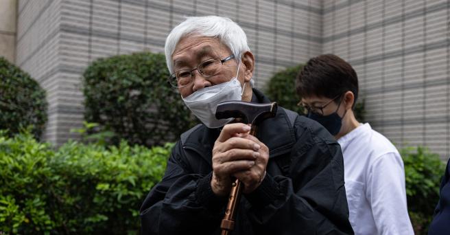 Cardinal Joseph Zen standing outside a courthouse in Hong Kong.
