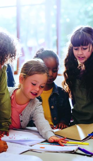 Photo of kids learning at school
